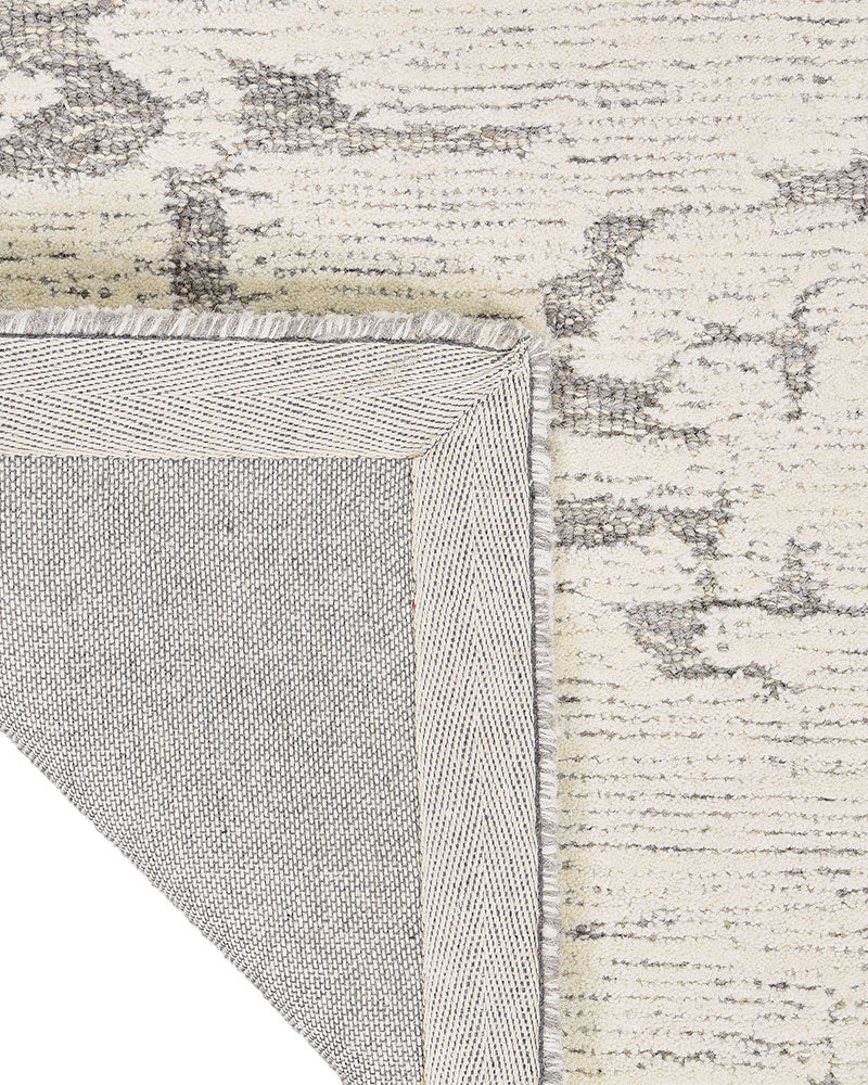CALVIN KLEIN SCULPTURAL GREY CUT & LOOP WOOL RUG