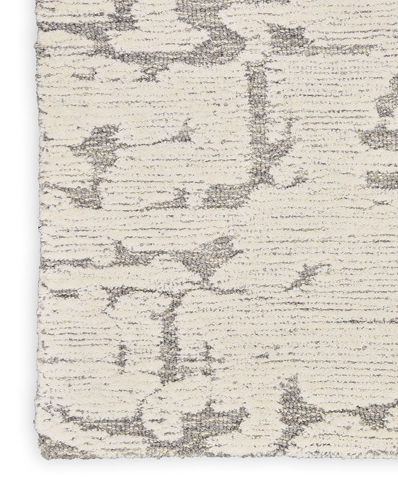 CALVIN KLEIN SCULPTURAL GREY CUT & LOOP WOOL RUG