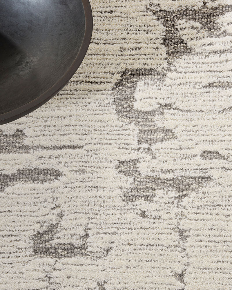 CALVIN KLEIN SCULPTURAL GREY CUT & LOOP WOOL RUG