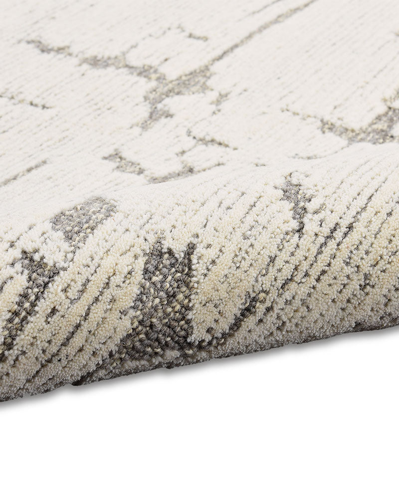 CALVIN KLEIN SCULPTURAL GREY CUT & LOOP WOOL RUG
