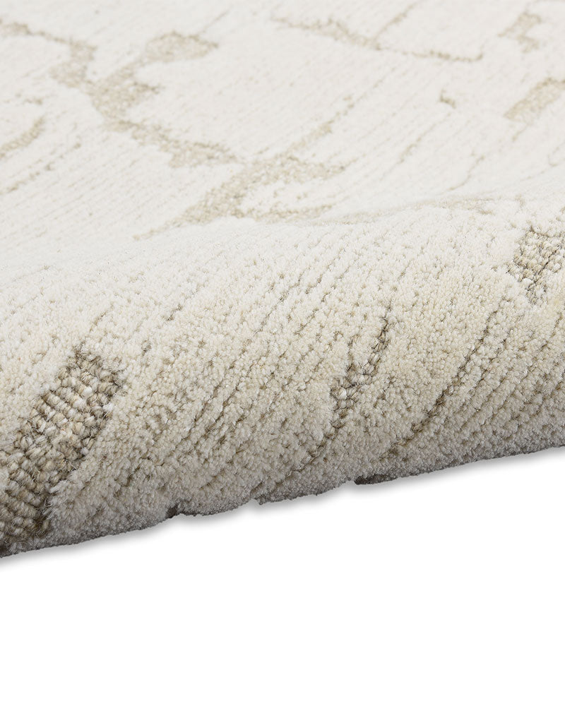 CALVIN KLEIN SCULPTURAL IVORY CUT & LOOP WOOL RUG