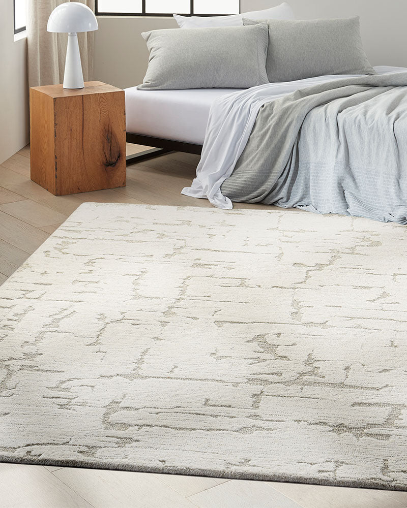 CALVIN KLEIN SCULPTURAL IVORY CUT & LOOP WOOL RUG