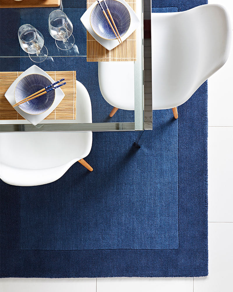 BORDER PLAIN NAVY WOOL RUG