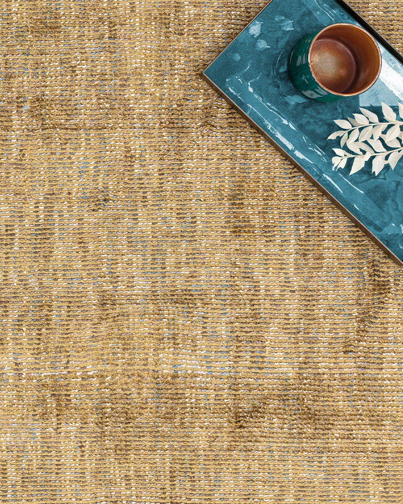 ASTON PLAIN VISCOSE OCHRE DISTRESSED EFFECT SHIMMER RUG