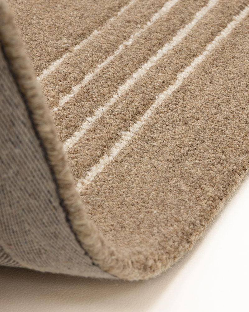 ORLO BEIGE NATURAL UNDYED WOOL BORDERED RUG