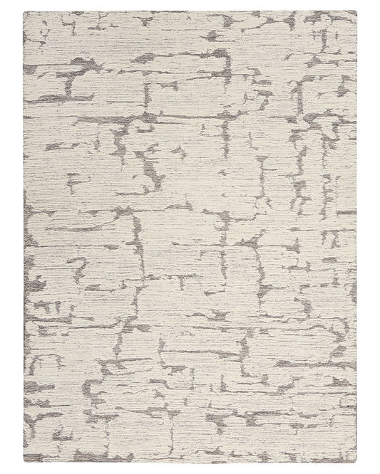 CALVIN KLEIN SCULPTURAL GREY CUT & LOOP WOOL RUG