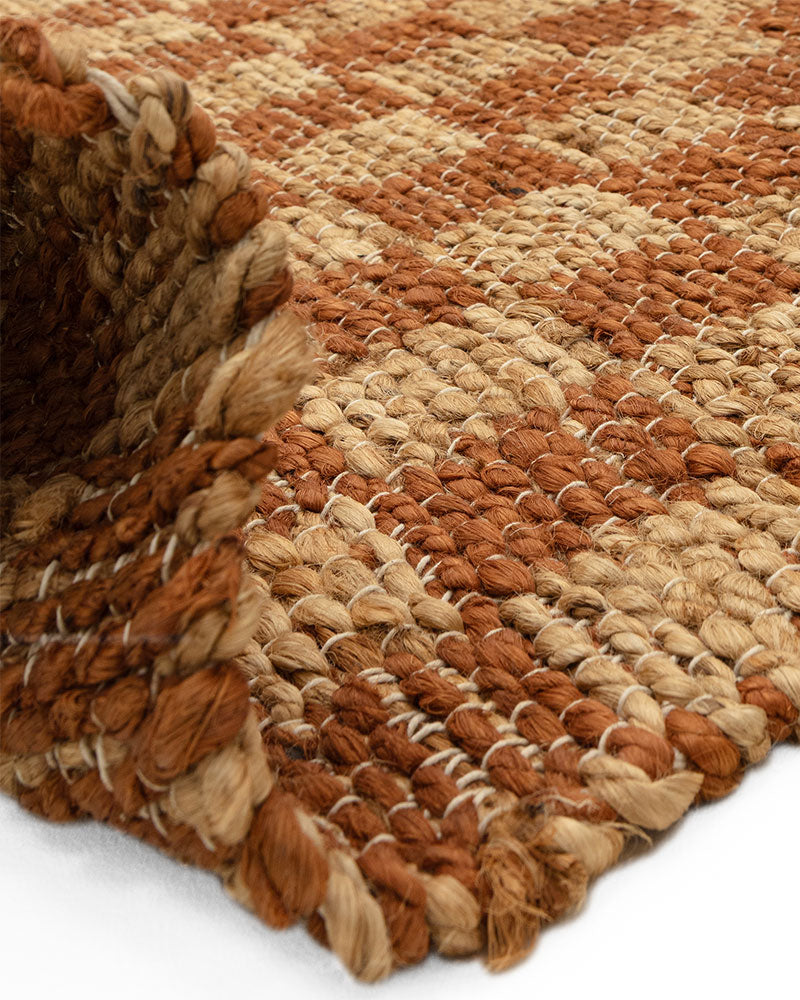 NATURI NATURAL RUST CHECKERBOARD JUTE RUG (PRE-ORDER)